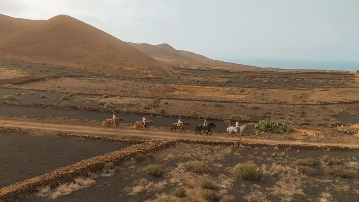The Lanzarote coastline under a moody, changing sky